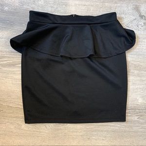 Peplum black mini skirt